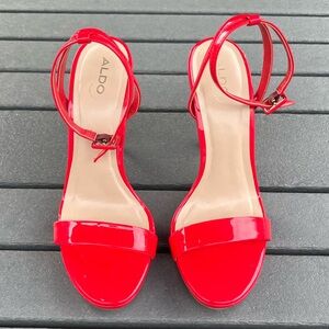 ALDO; Shiny Red Exterior; Ankle Buckle; Size 9; 4.5in Heels; NWT; Minor Wear